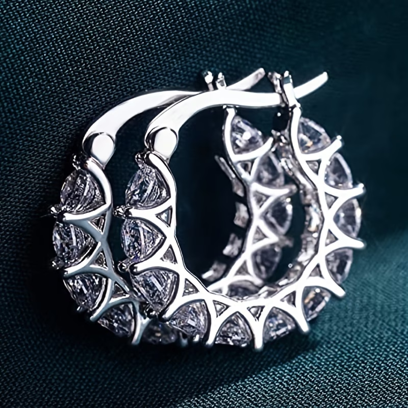 Crystal teardrop cubic zirconia hoop earrings in silver tone